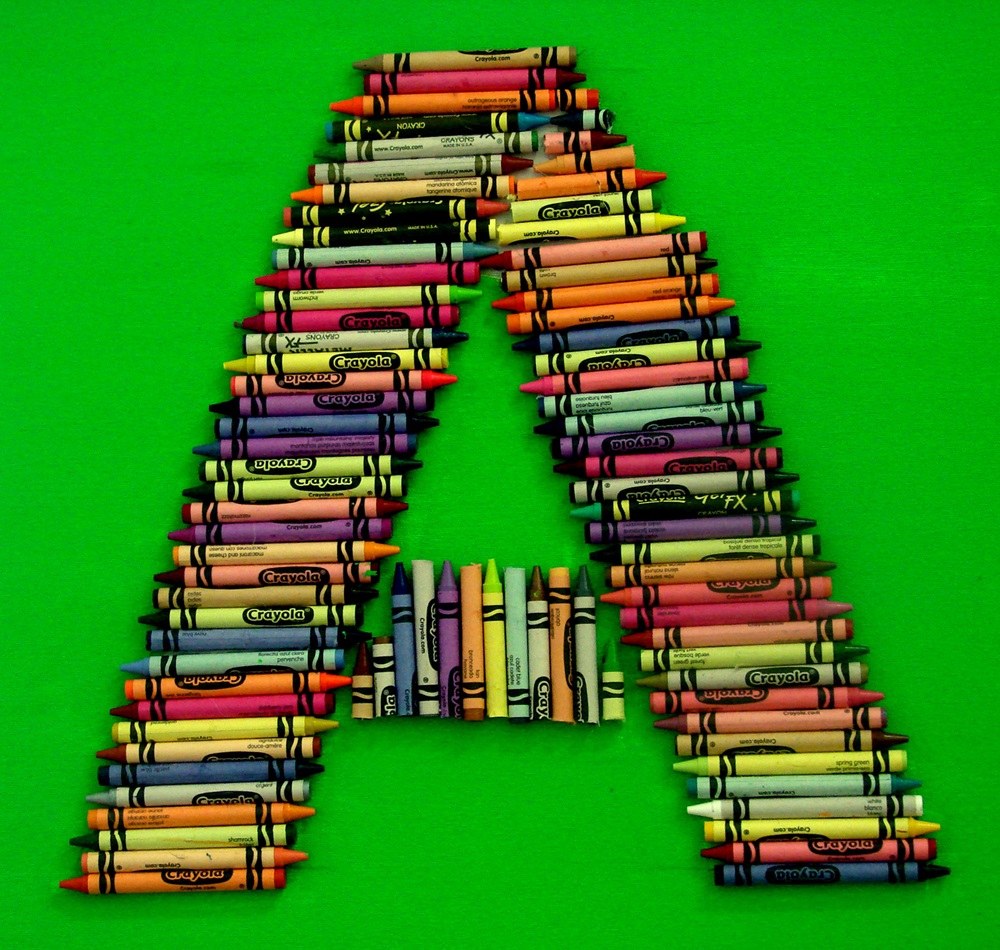Creative wall displays, including this letter “A” made of crayons, are a feature of the re-opened Dallas Bethlehem Center. Photo by Sam Hodges, UMNS 