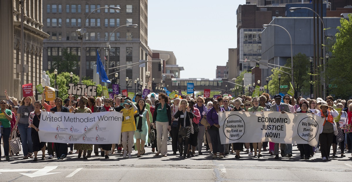 United Methodist Women and community activists rally for economic justice in Baxter Square Park.