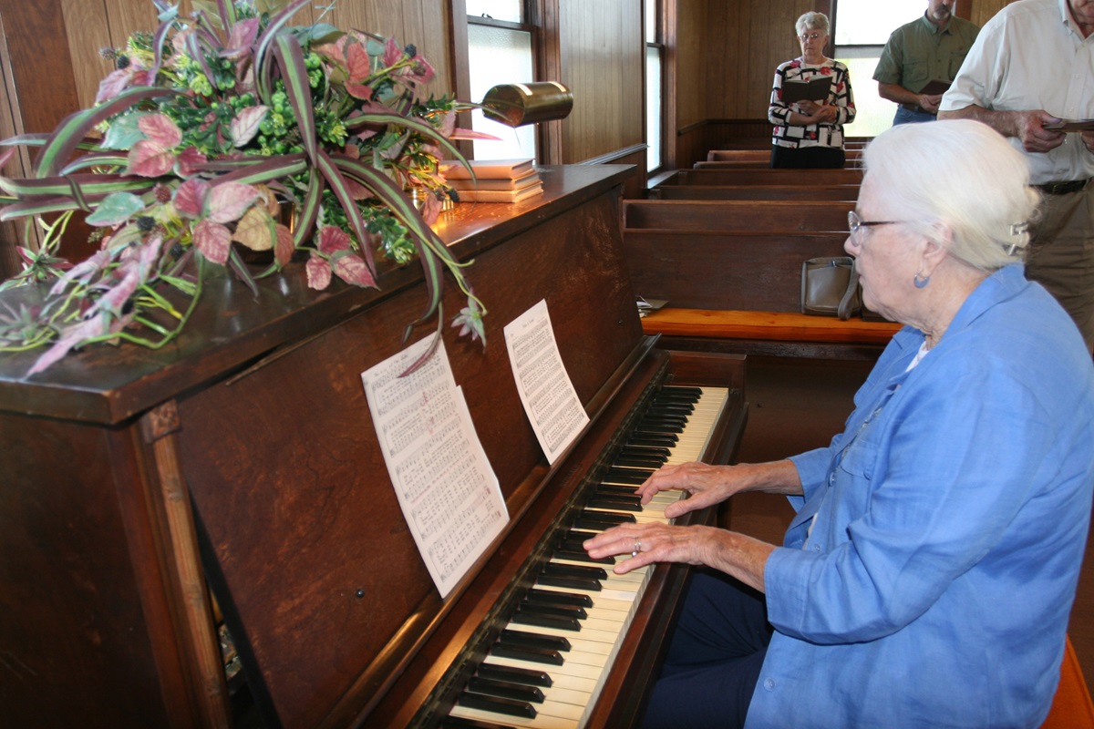 Patsy Melton, a member of Hunter's Chapel, accompanies congregational singing during worship at Tulip United Methodist Church. Photo by Heather Hahn, UMNS.