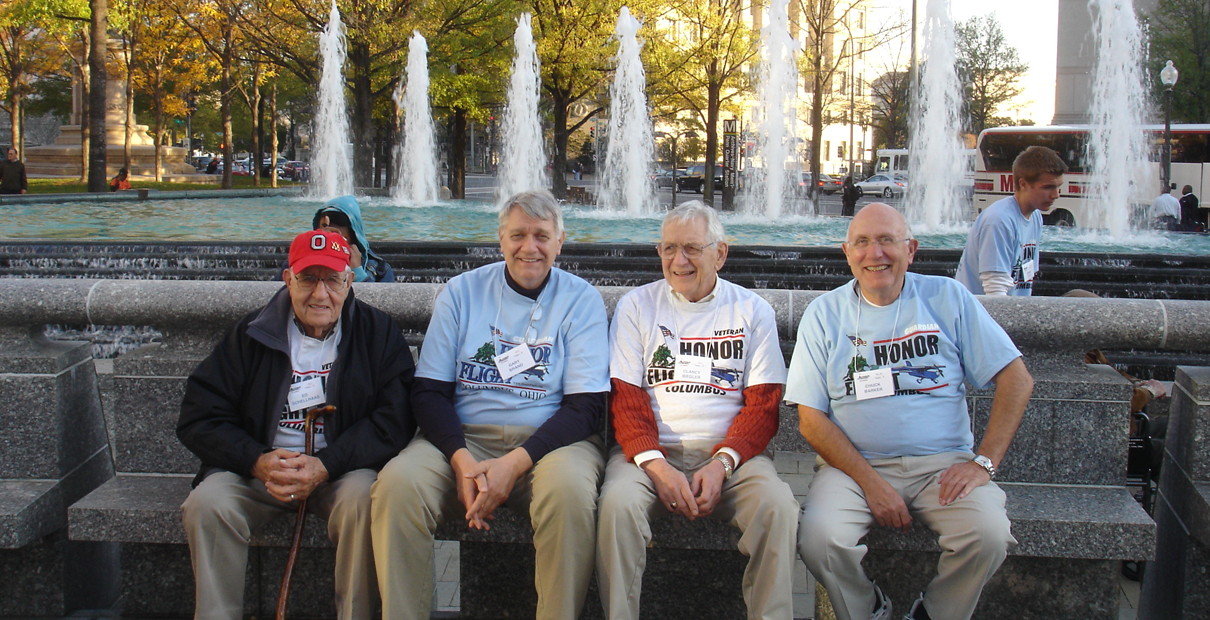 (From left) Ed Schellhaas, Gary Brand, Clancy Biegler, and Charles Barker, all members of Trinity United Methodist Church in Columbus, Ohio, traveled to Washington as part of Honor Flight. Biegler was among the veterans on the flight; Brands, Schellhaas and Barker traveled as guardians. Photo by Jeff Fisher.