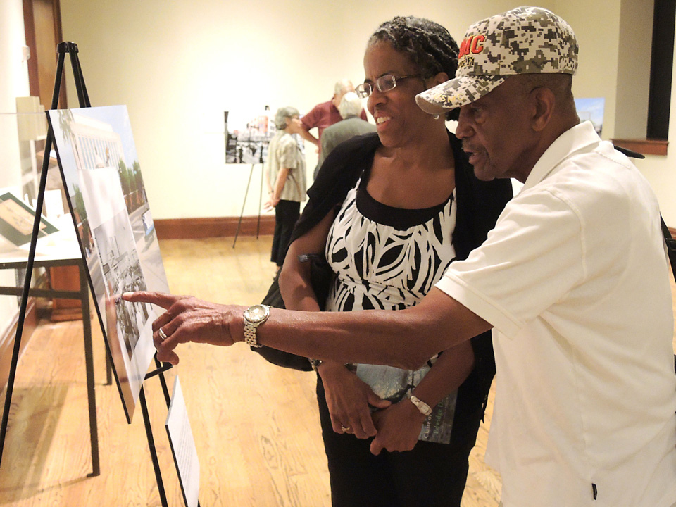 Cheryl and William J. Claybrooks Sr. look at McCormack’s photos during an exhibit at the library “Because of You: An Evening of Photography and Literature Commemorating Nashville’s Civil Rights Movement.” 