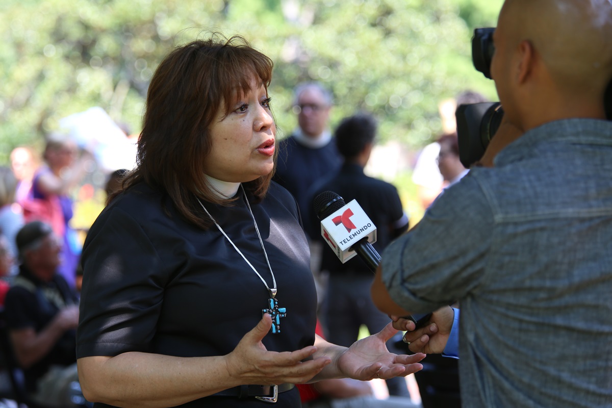 Bishop Minerva Carcaño speaks to the press during the immigration rally events in Washington on July 31, 2014. 