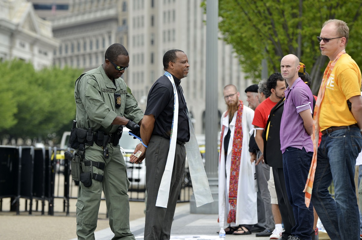 The Rev. John McCullough, a United Methodist and president and CEO of Church World Service, was among faith leaders arrested in immigration deportation protest.