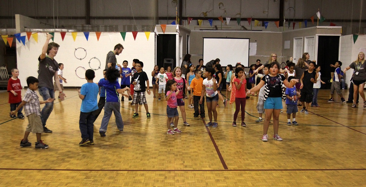 Music, movement and laughter abound in the gym at Antioch United Methodist Church during the Project Transformation Family Fun Night.