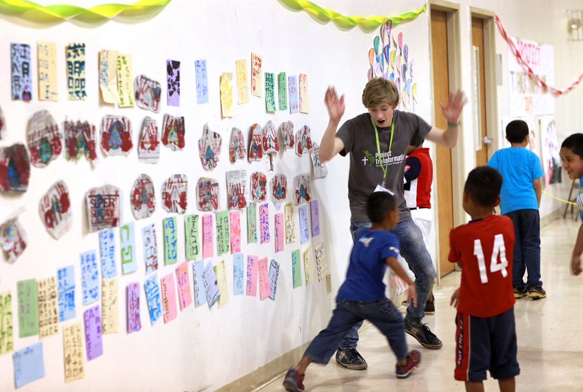 Justin Mayo from Cookeville First United Methodist Church plays with youth at the Family Fun Night.