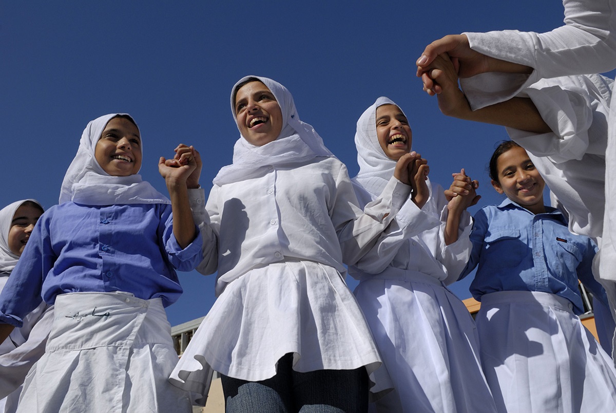 Girls exercise in the physical education class at Al-Zaytoon School, located in the Jabalyia Refugee Camp in the war-torn Gaza Strip, in 2006. File Photo by Paul Jeffrey.
