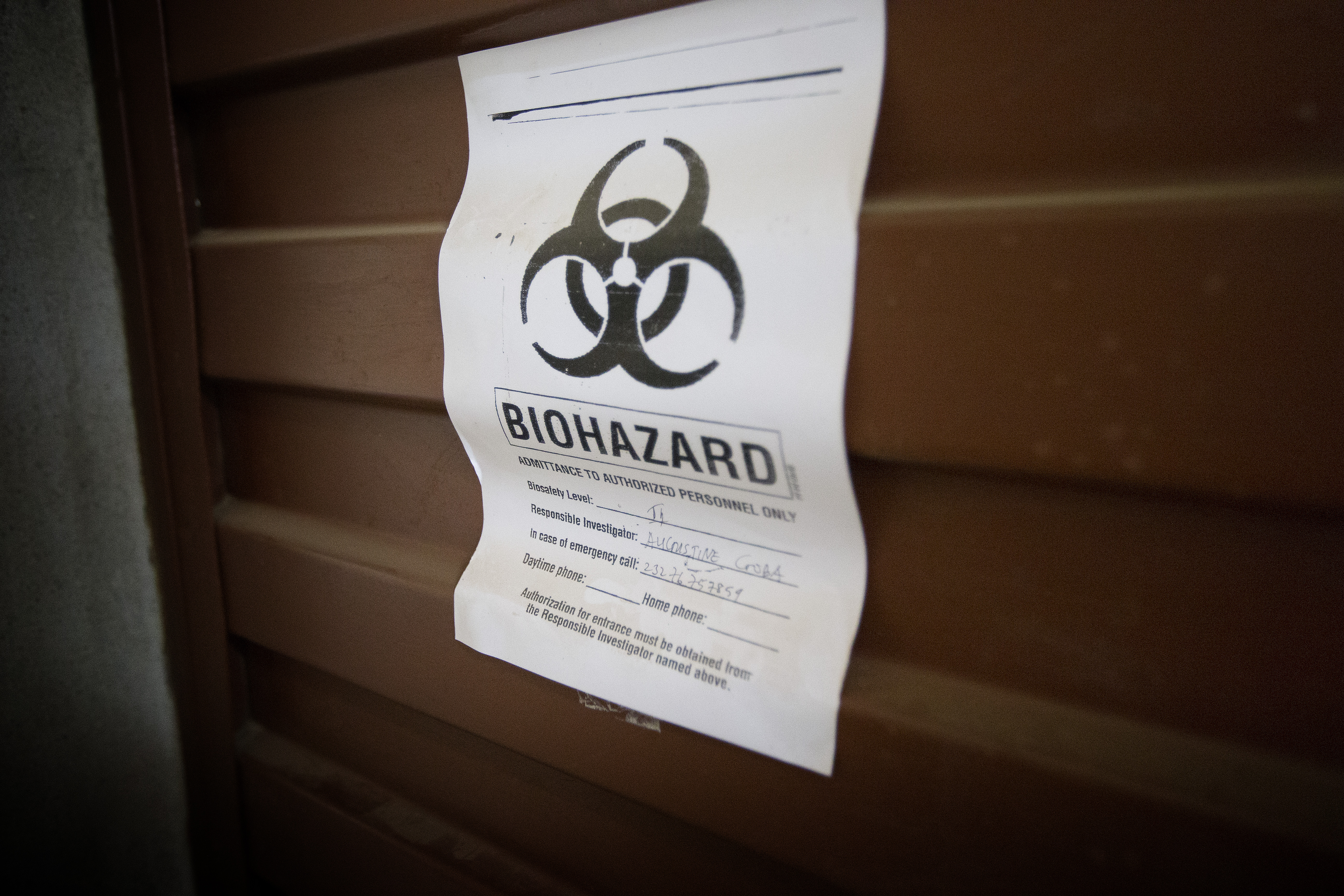 A sign warns of biological hazards in the Lassa fever laboratory at the government hospital in Kenema, Sierra Leone, where current efforts are centered on preventing the spread of the Ebola virus. United Methodist church leaders in West Africa are educating people about prevention, diagnosis and treatment of the disease.