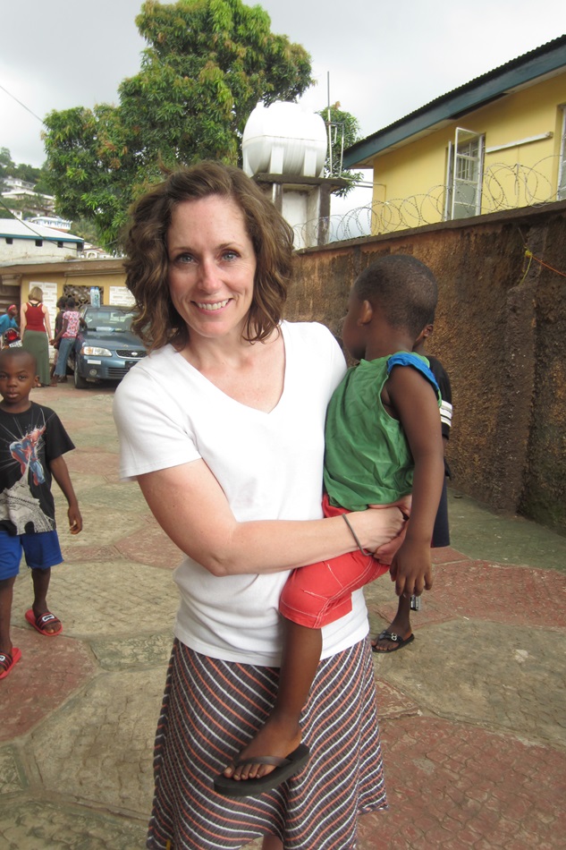 Debbie Bonn holds a resident of The Raining Season orphanage in Freetown, Sierra Leone.  