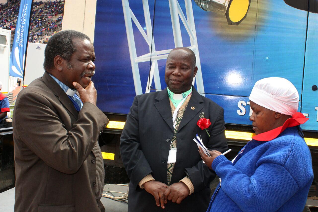 (From left) 
The Rev. Jairios Mafondokoto  and the  Rev. Kelvin Mwandira are interviewed by  Eveline Chikwanah  at Ebenezer Convention. Photo by Ray Mungomez