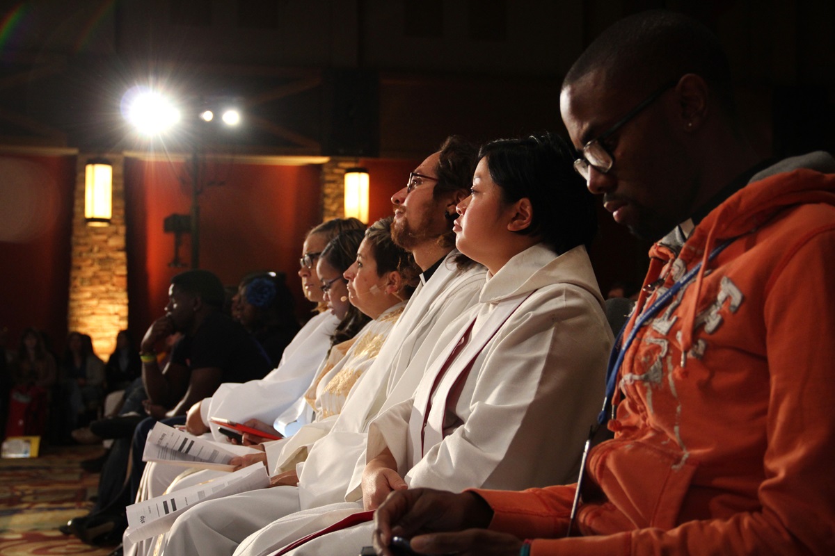 Robed clergy at the closing worship service of Exploration 2013 in Denver, Colo. From left, Karli Pidgeon, Jasmine Smothers, Bishop Cynthia Fierro Harvey, Alejandro Alfaro Santiz, Betty Nguyen, and Michael Parker.  Photo by Joseph McBrayer