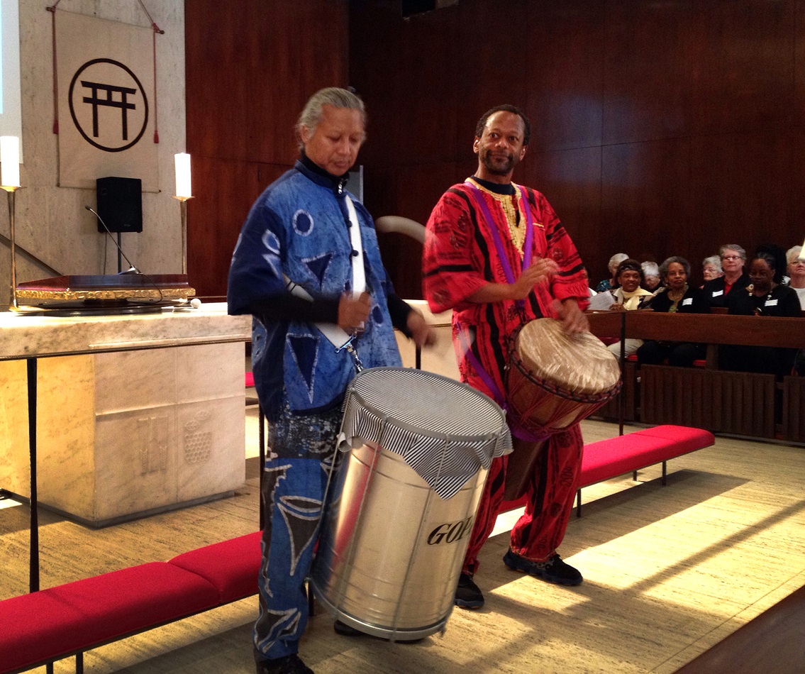 Victor See Yen, left, and Ron McBee of Heritage O.P., an acoustic percussion and vocal ensemble, drum for peace during a symposium Sept. 19 at the Church Center for the United Nations. Photo by Linda Bloom, UMNS. 