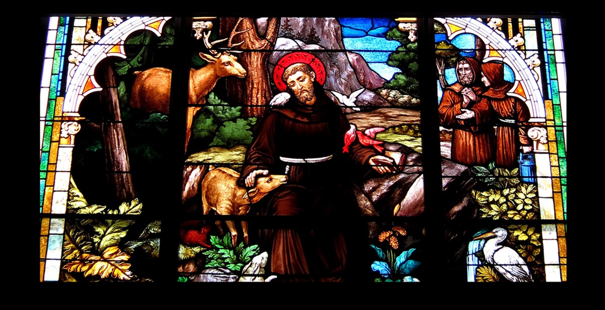 Close up of photo shows stained glass window in St. Francis Catholic Church in Cranberry Prairie, Ohio. Original photo by Nheyob, courtesy Wikimedia Commons.