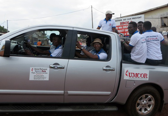 A Sierra Leone Annual Conference team of young adults travel with PA system and materials offering prayer and Ebola education through dramas. 