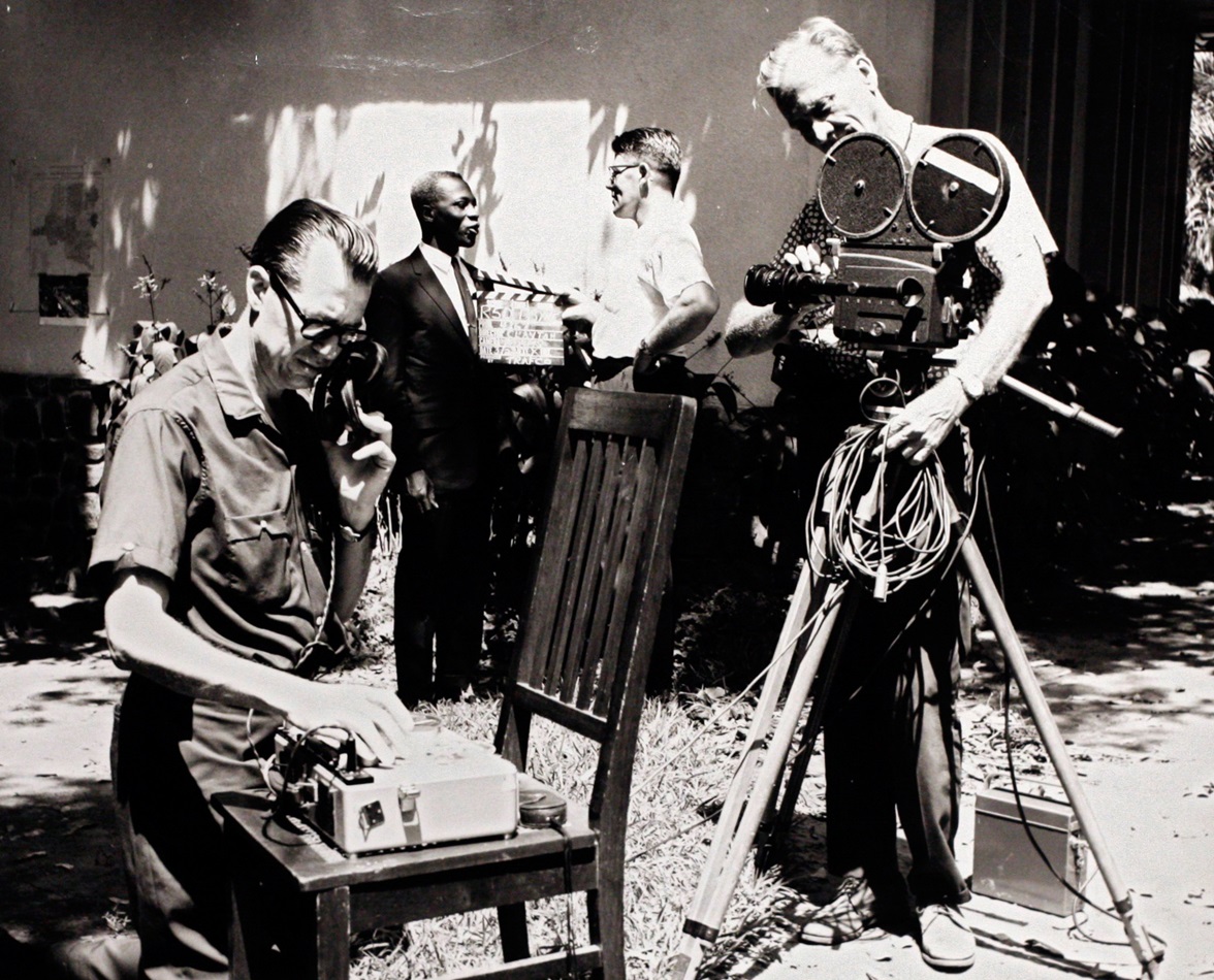 Ben Logan (left) a producer and writer for the church’s communication agency, runs sound recording equipment during a motion picture shoot in this undated file photograph. Photo from United Methodist Communications archives.