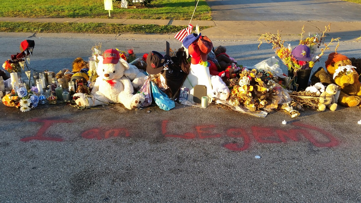 A memorial rests on the site of the shooting of Michael Brown in Ferguson, Mo. Johnson runs to the site and says a prayer most Sundays mornings. Photo by F. Willis Johnson 