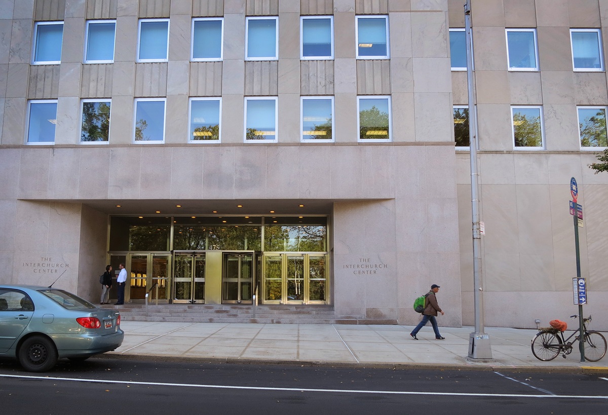 A pedestrian walks past the 475 Riverside Drive entrance to the Interchurch Center in New York, where the United Methodist Board of Global Ministries has been a tenant for more than 50 years. Photo by Linda Bloom, UMNS