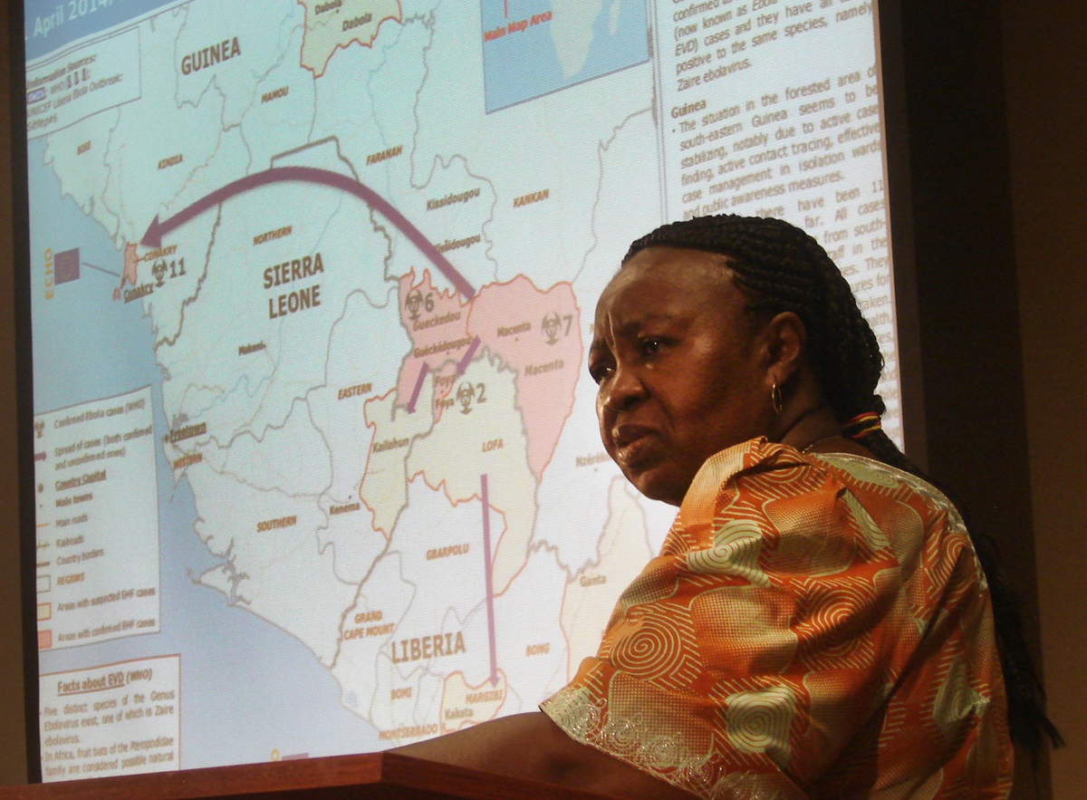 During the briefing, Beatrice Gbanga shows a map of Sierra Leone. Photo by Sam Hodges, UMNS