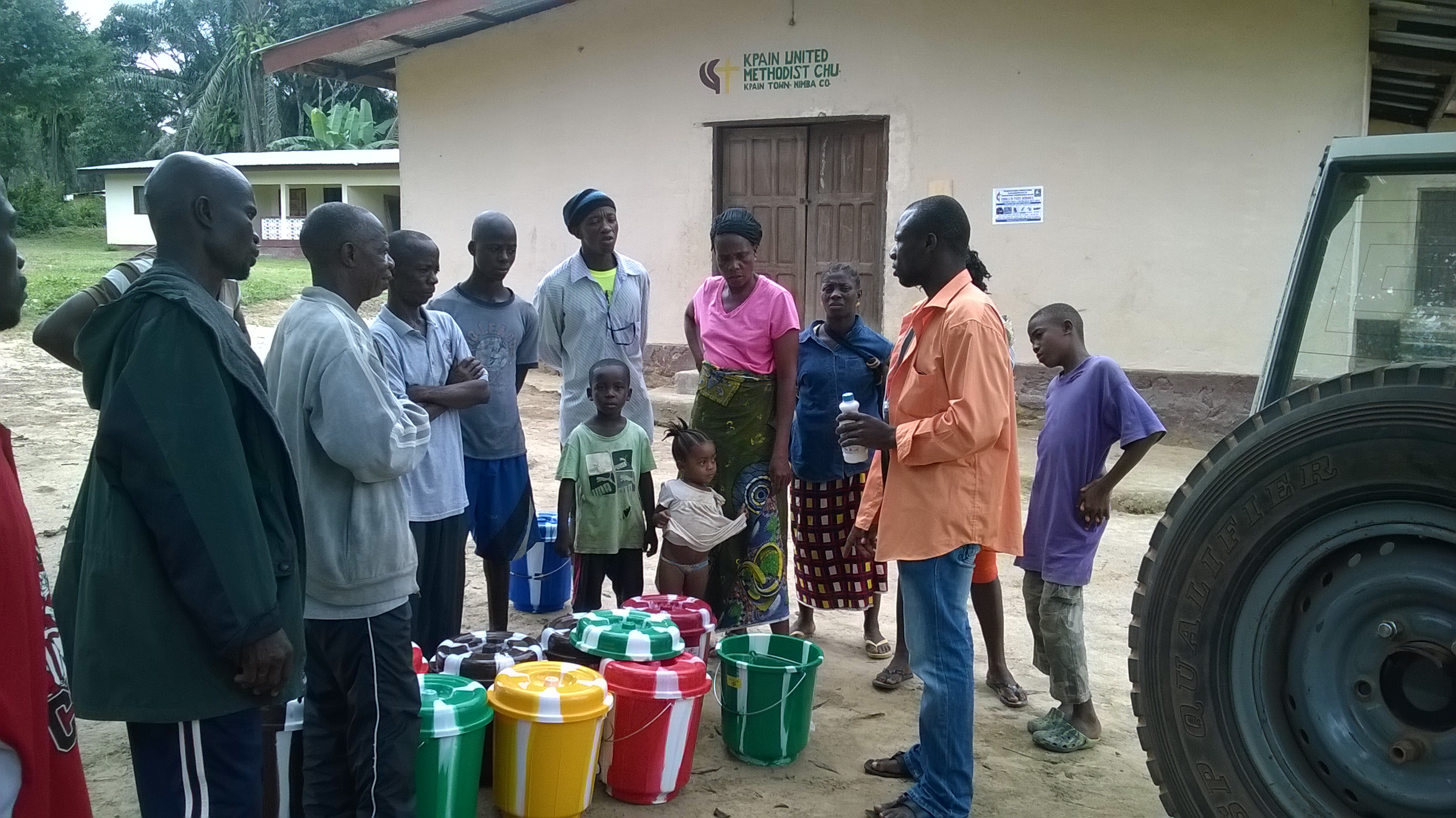 Buckets with sanitary supplies for hand washing are delivered to churches in Gompa District.