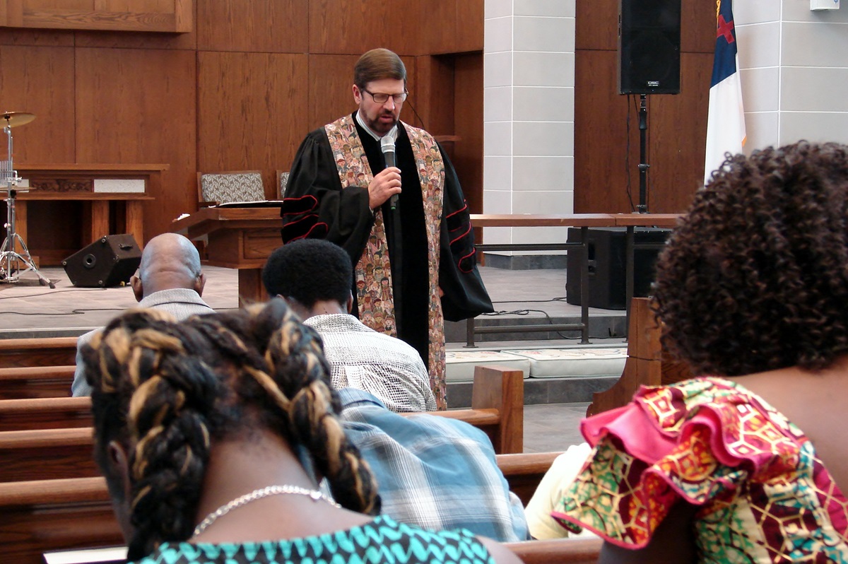 The Rev. Stan Copeland, senior pastor of Dallas’ Lovers Lane United Methodist Church, prays about Ebola. 