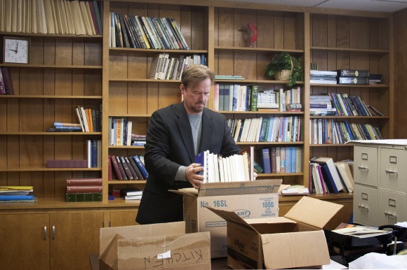 Frank Schaefer packs books as he leaves Zion Iona United Methodist Church after members of the congregation feted him at a farewell celebration on Jan. 5. Photo by Kathy L. Gilbert, UMNS.