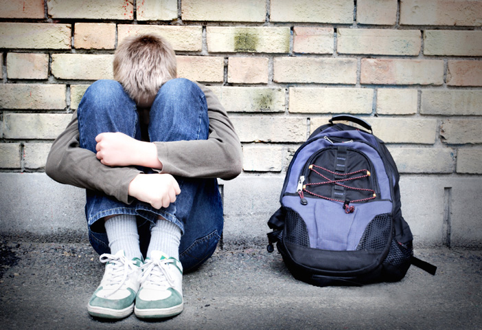 SafeYouth.org reports that every school day, 160,000 American children stay home to avoid being bullied. And every year, more than 19,000 children attempt bullying-related suicide. Photo illustration courtesy of iStockphoto/Mikael Dankier.