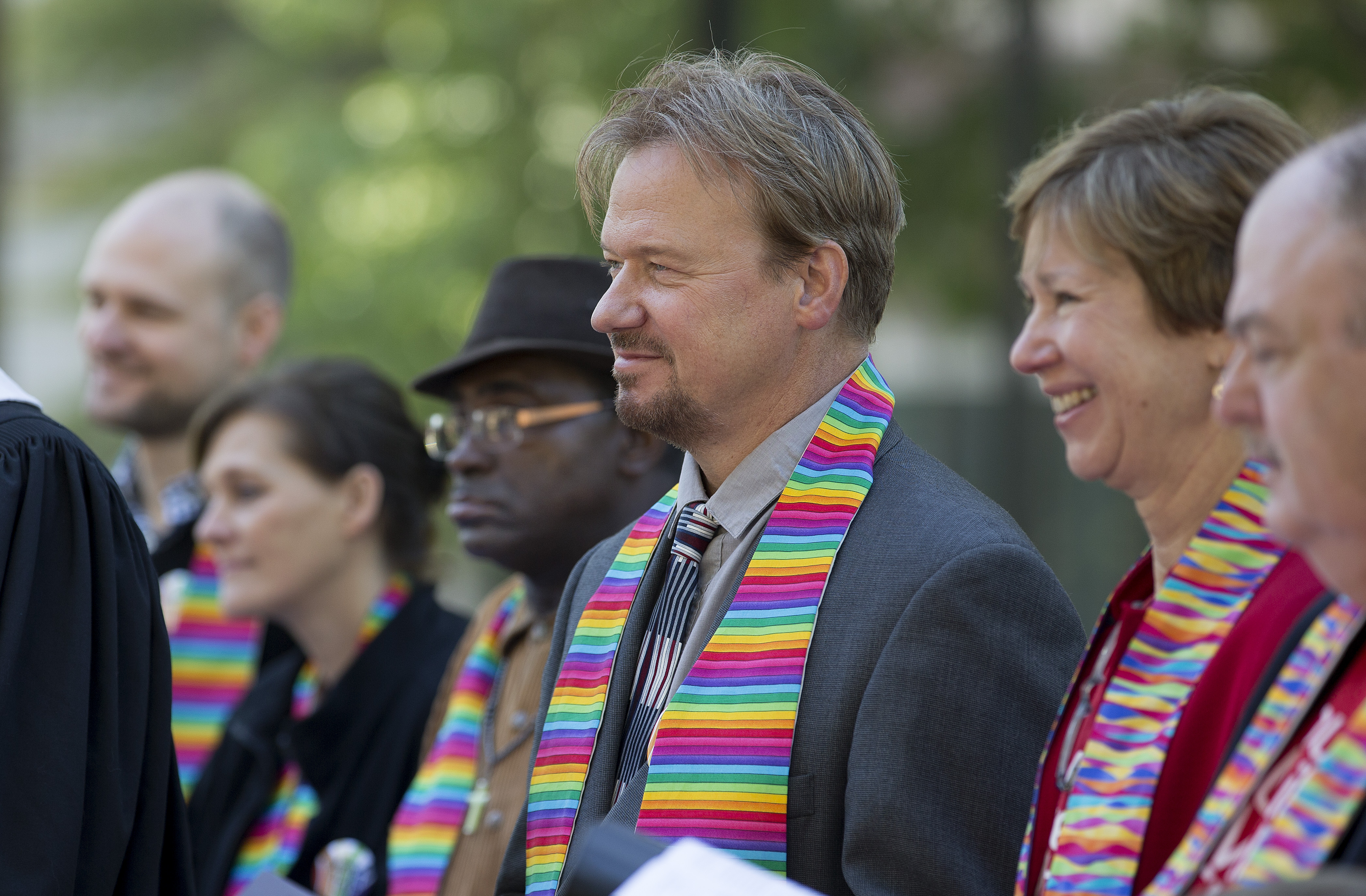 The Rev. Frank Schaefer (third from right) stands with family and supporters during a prayer service for unity at Court Square Park in Memphis, Tennessee, prior to the Oct. 22 oral hearing on his case by the United Methodist Judicial Council. Schaefer was found guilty in a November 2013 church trial of performing a same-sex wedding ceremony for his son but regained his clergy credentials upon appeal. Photo by Mike DuBose, UMNS.