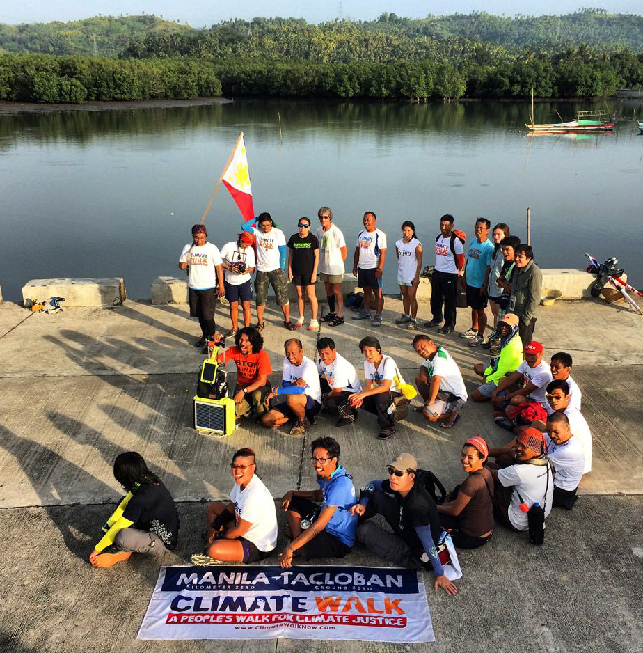 Marchers are walking for 40 days to call attention to how climate change effects on vulnerable countries like the Philippines. They are shown near Basey. 