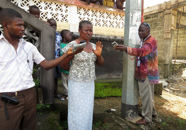 Hawa Conteh, a single mother under forced quarantine, was comforted by the United Methodist team and given food and cleaning supplies. She is upset about the challenges she faces being in quarantine. 