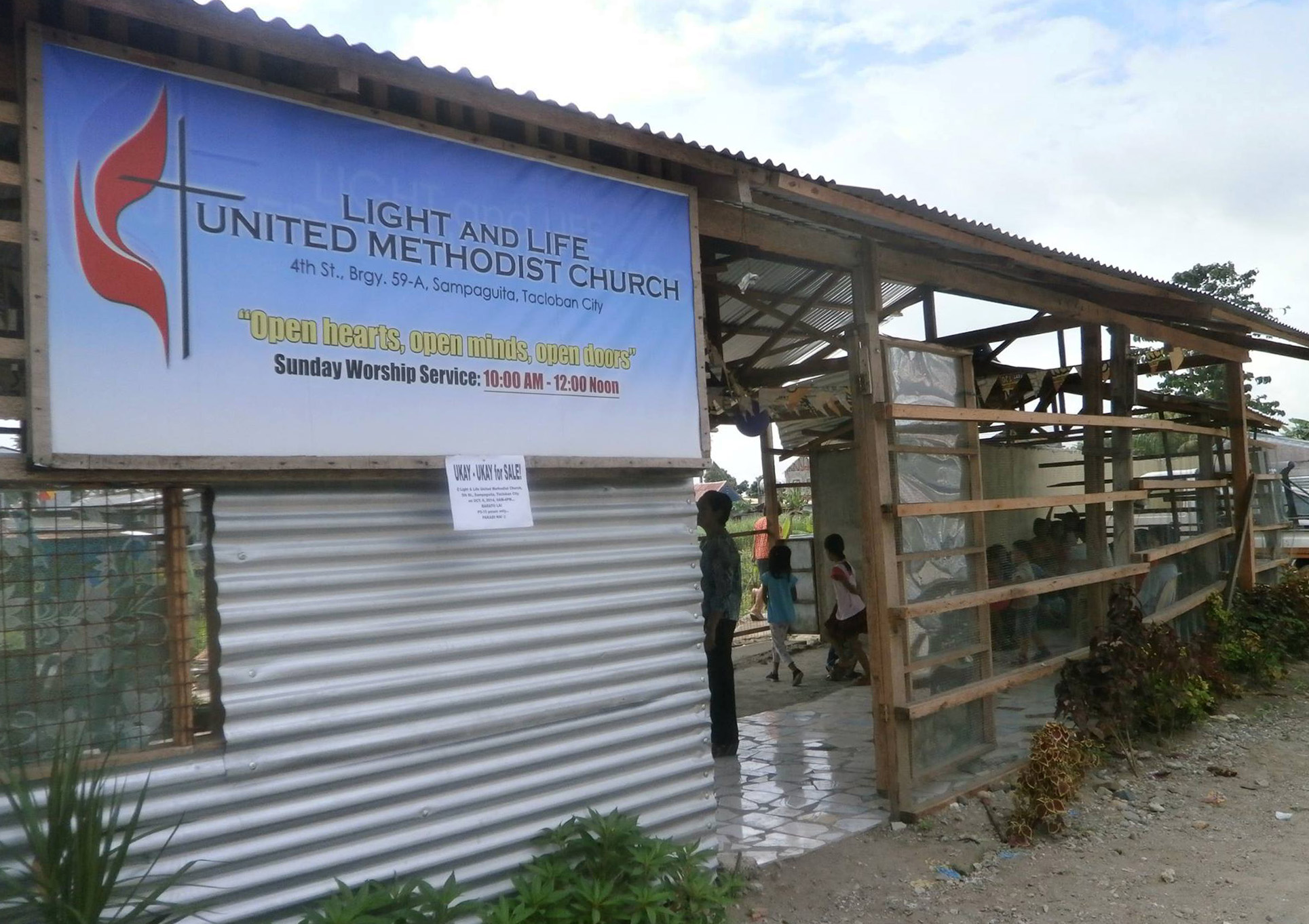 Light and Life United Methodist Church in Tacloban City, Philippines, is still housed in a temporary building a year after Typhoon Yolanda destroyed the previous sanctuary. Photo by Iris Terana and Geraldine Ayoste, UMNS