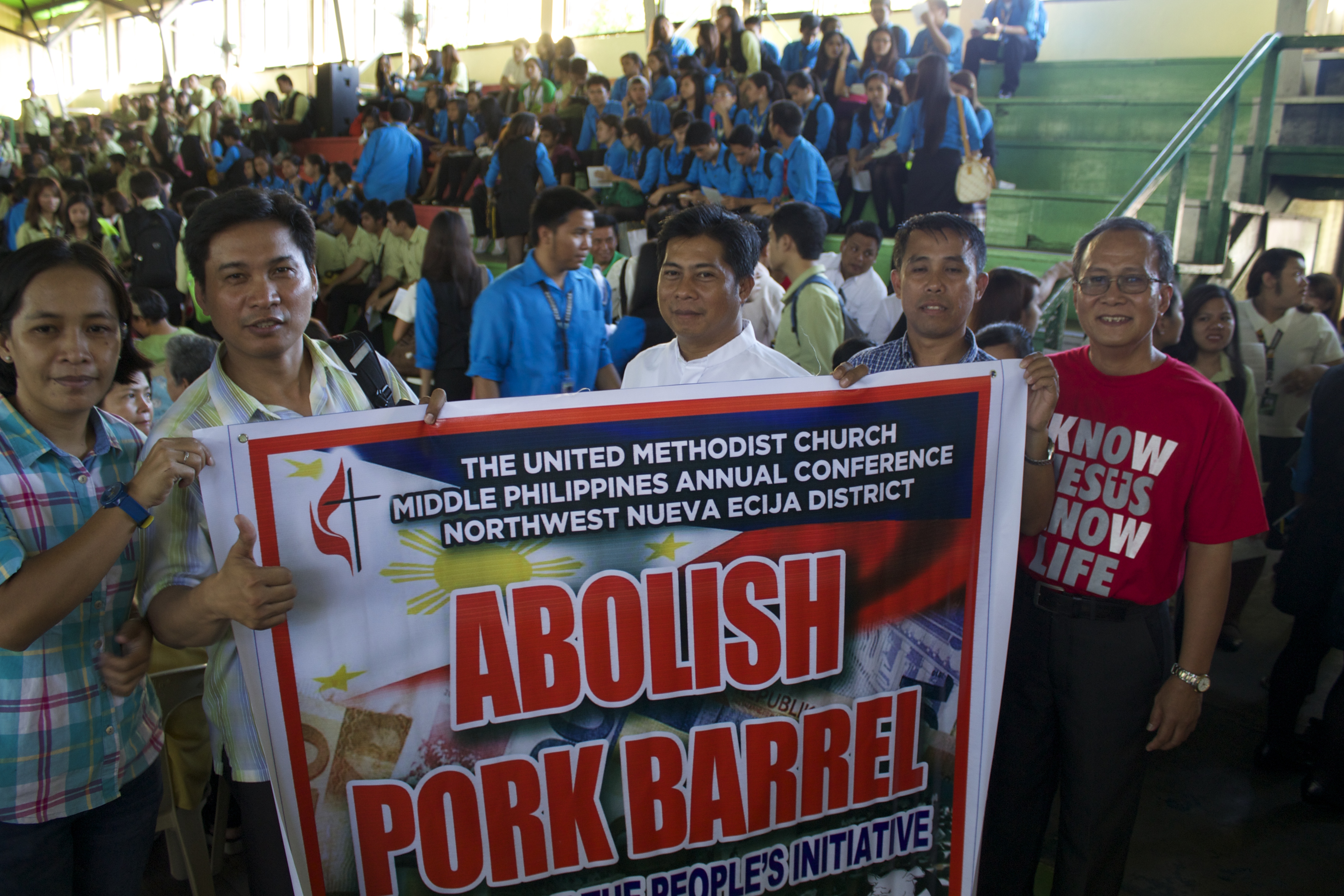 Marchers assemble in the Wesleyan University gymnasium before walking a mile in solidarity to the Plaza Lucero for a candlelight vigil to express displeasure with government corruption. Photo courtesy of Gladys P. Mangiduyos
