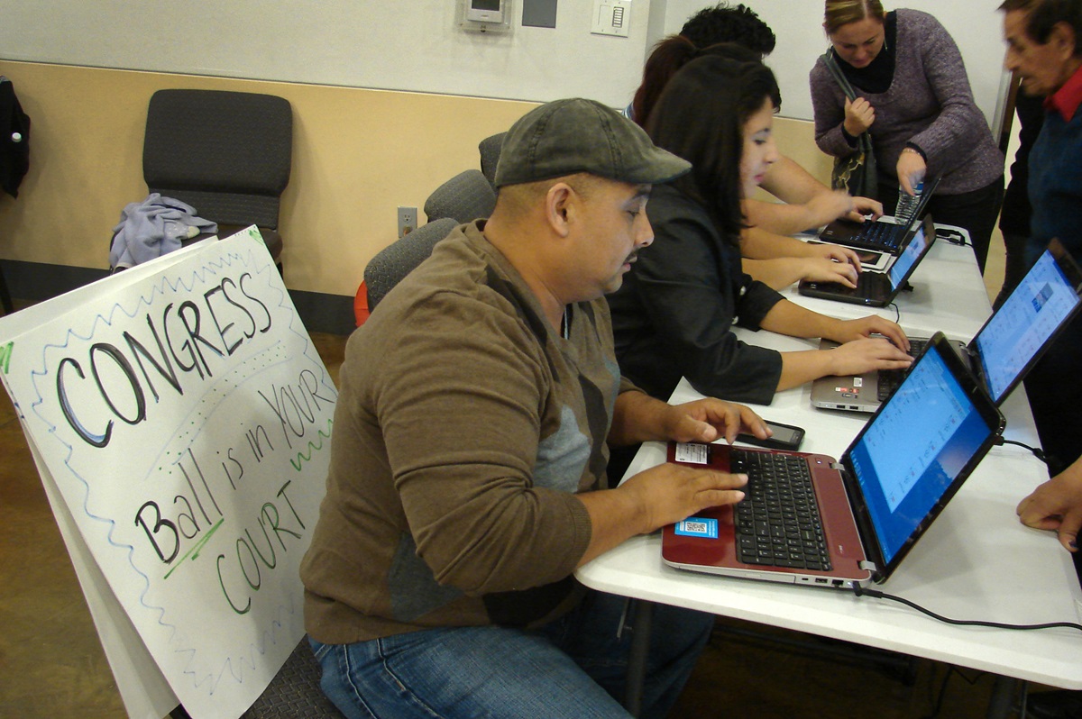 Christ's Foundry United Methodist Church in Dallas held a watch party for President Obama's Thursday, Nov. 20 televised address on immigration. Before the address, volunteers took names and addresses of those attending, hoping to help with their application for legal status. 