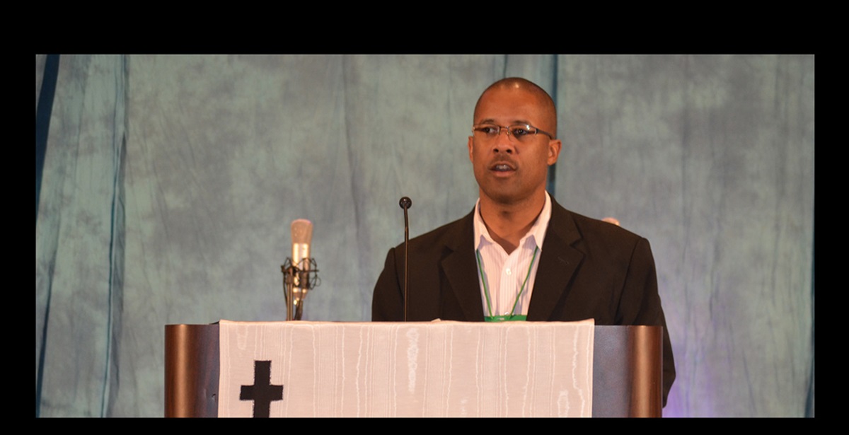 The Rev. Cedric Bridgeforth presents the restructuring plan at the meeting of Black Methodists for Church Renewal in Chicago in March 2013. Photo by the Rev. Maidstone Mulenga for United Methodist News Service.