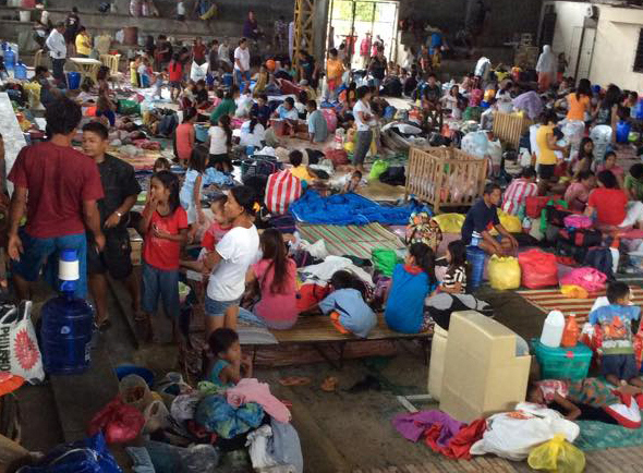 Evacuation preparation takes place in a gymnasium in Isabel Leyte, Philippines, an area of high risk. Photo courtesy of Sharon Aradanas
