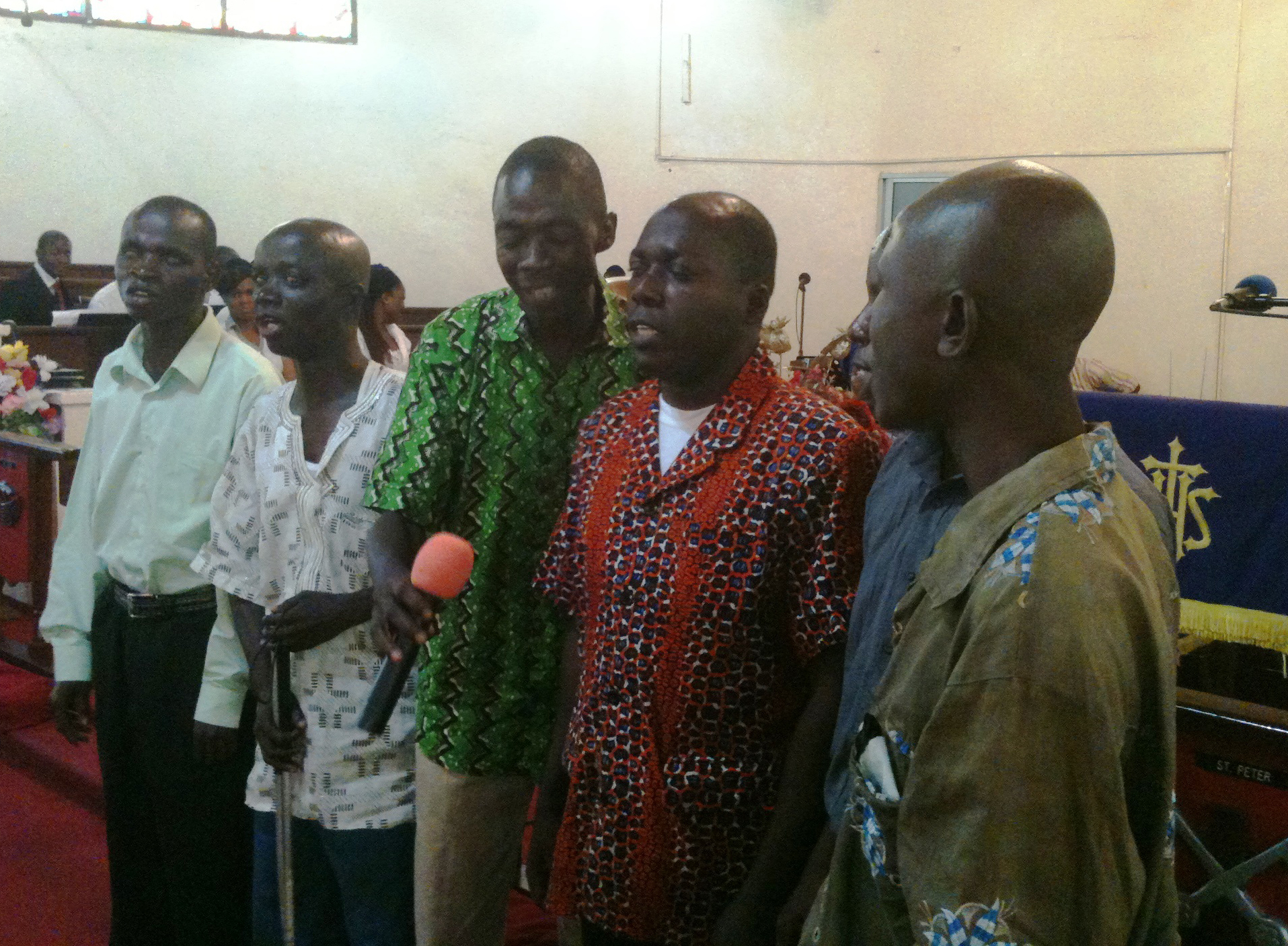 Blind students help lead the singing during the celebration of United Methodist Student Day at Stephen Trowen Nagbe United Methodist Church in Liberia. The church distributed food and other items to the physically challenged students and their families. 
