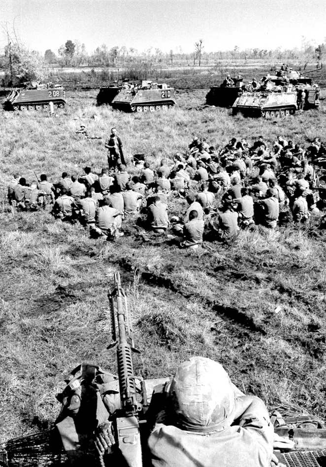 Chaplain Carter conducts a service in the field with the 3rd Brigade, 1st Infantry Division. His daughter, Cindy, was born the day these photos were taken. 