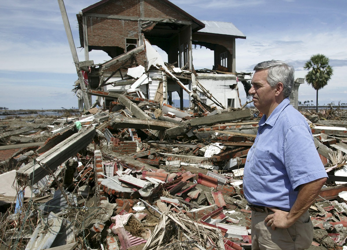 The Rev. R. Randy Day surveys destroyed homes along the beach in Banda Aceh, Indonesia. A UMNS photo by Mike DuBose.