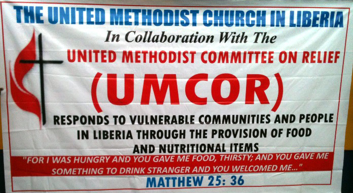 This banner was printed specifically for the purpose of the collaboration between The United Methodist Committee on Relief and The United Methodist Church in Liberia in on food distribution. Photo by Julu Swen, UMNS