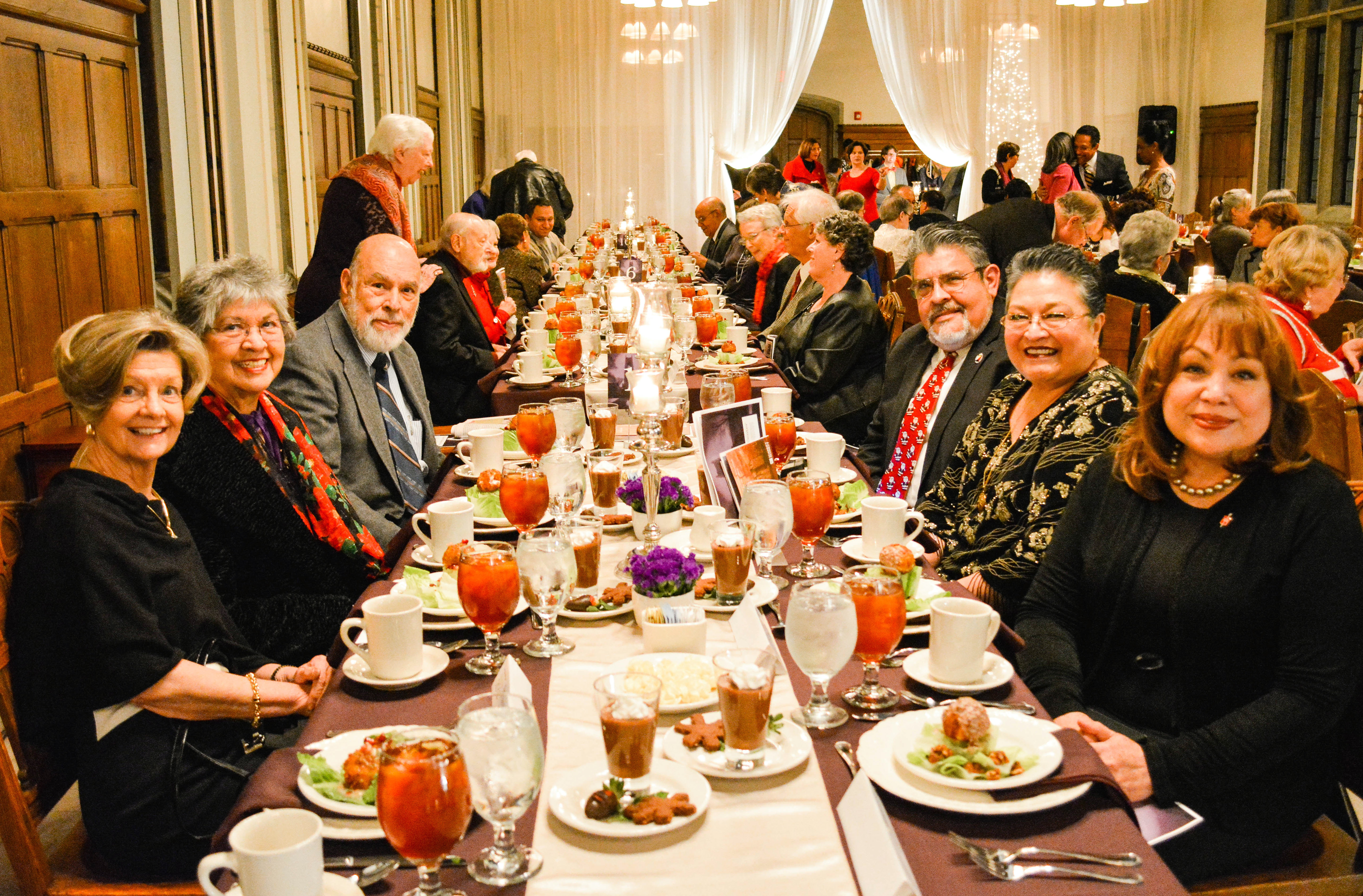 (From left) Jane Bucher, Pauline Alvirez, David Alvirez, Raul Alegria, Bilha Alegria, Bishop Minerva Carcaño are a few of the attendees of the Dec. 6 awards dinner at Scarritt Bennett.