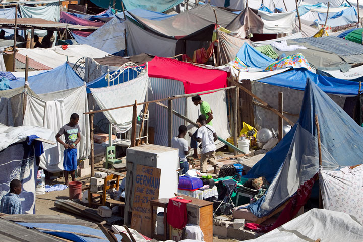 Families crowd a makeshift camp at the municipal soccer stadium in Leogane, Haiti, following the earthquake.