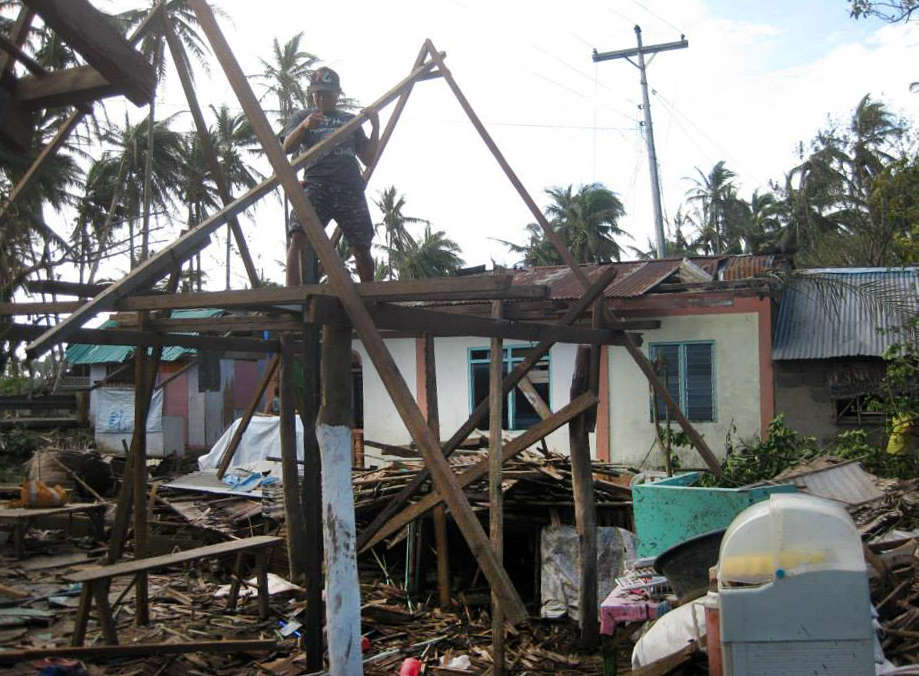 Typhoon Hagupit damaged this home in Taft in the province of Eastern Samar. The typhoon, which made landfall in the Philippines on Dec. 6, is also known in the Philippines as Ruby. Photo by Marlon Paano Lasaca
