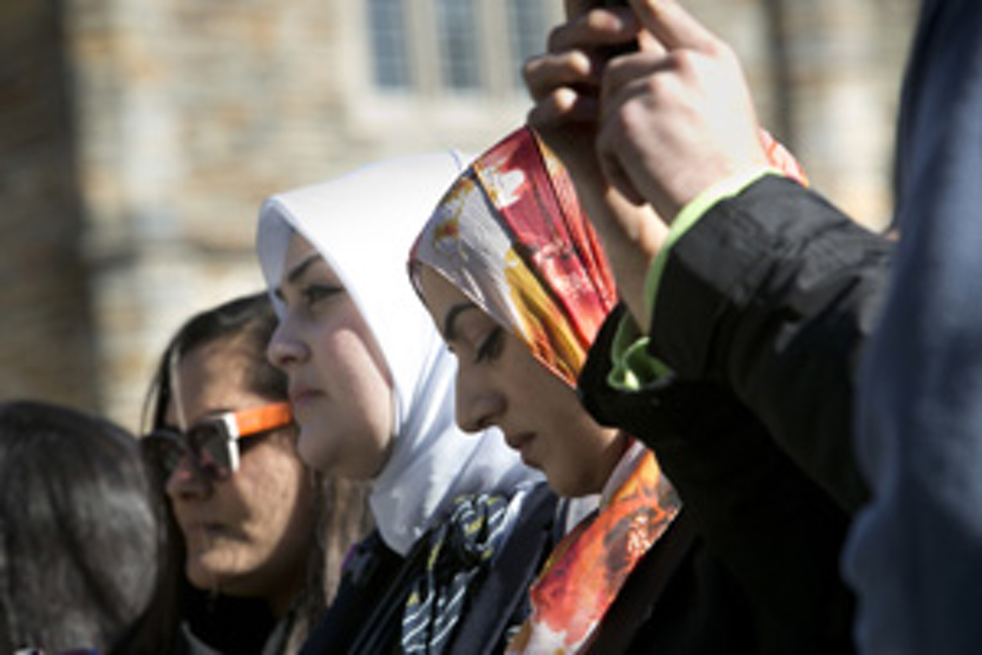 Muslim students at Duke University have used the basement of Duke Chapel for years for prayer services. They gathered outside the chapel on January 16, 2015, for the adhan, or call to prayer. Duke first agreed to let the students do the adhan from the chapel bell tower, but reversed the decision. Photo by Megan Morr, © Duke Photography