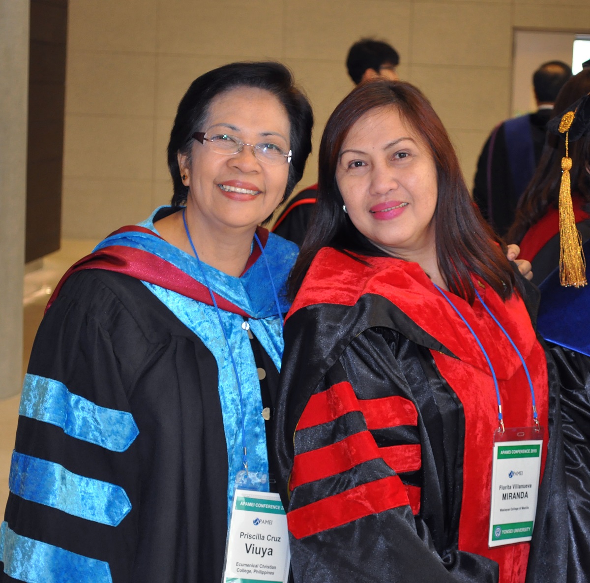 Priscilla Viuya, left, and Florita Villanueva Miranda at the meeting of the Asia-Pacific Association of Methodist-related Educational Institutions in Incheon, Korea. Photo by Kimberly Lord, GBHEM