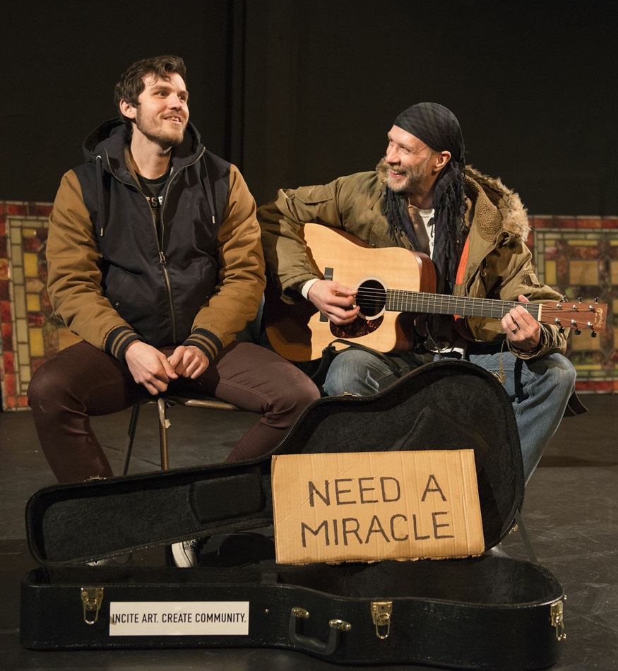 The character of Paul, played by Trevor St. John-Gilbert, is getting something to eat the church’s food pantry when he meets Saul, played by J.Stephen Brantley. Saul came to New York with dreams of a music career, but has fallen on hard times.Photo © Joel Weber