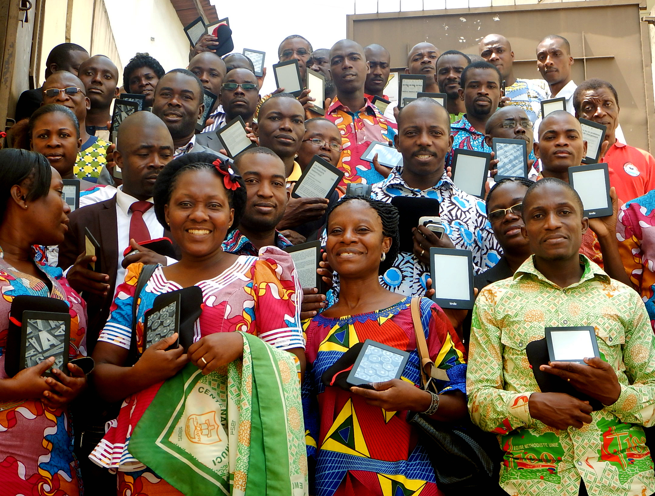 Students hold e-readers during the workshop at Methodist University.