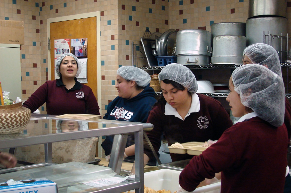 Students attending Lydia Patterson Institute on scholarship must work a campus job, and these girls help in the dining hall. Photo by Sam Hodges, UMNS