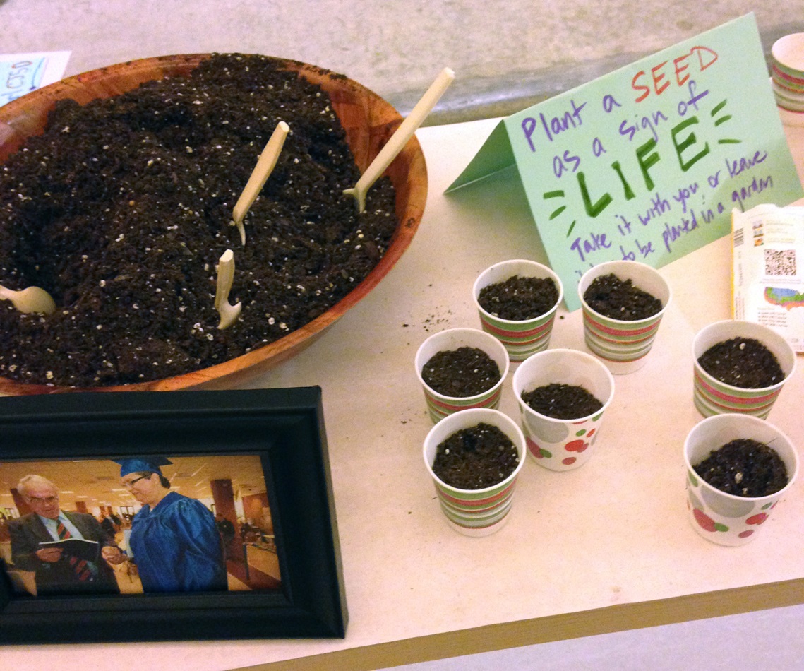 Seeds are distributed outside Cannon Chapel at Candler School of Theology on the night of the vigil held for Kelly Gissendaner. 