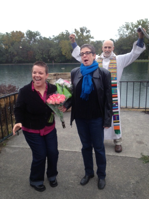 Sarah and DeLyn Celec are joined in marriage, officiated in October 2014, by the Rev. John D. Copenhaver Jr. The wedding was held at Jim Barnett Park in Winchester, Va. Resolutions of complaints against Copenhaver and the Rev. Amanda Miller Garber, have been reached after they officiated at separate same-sex weddings. 2014 file photo courtesy of the Celecs.