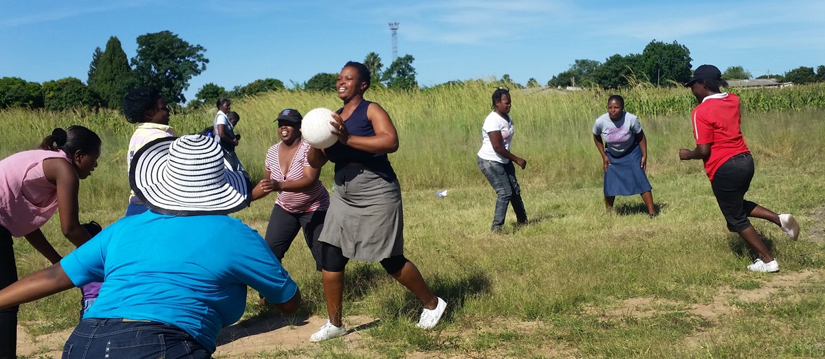 Tabitha Ruzyidzo, holding the ball, juggles roles of player, coach and referee during training sessions of the netball team of St. Peter’s United Methodist Church in Chitungwiza, Zimbabwe. Photo by Eveline Chikwanah, UMNS