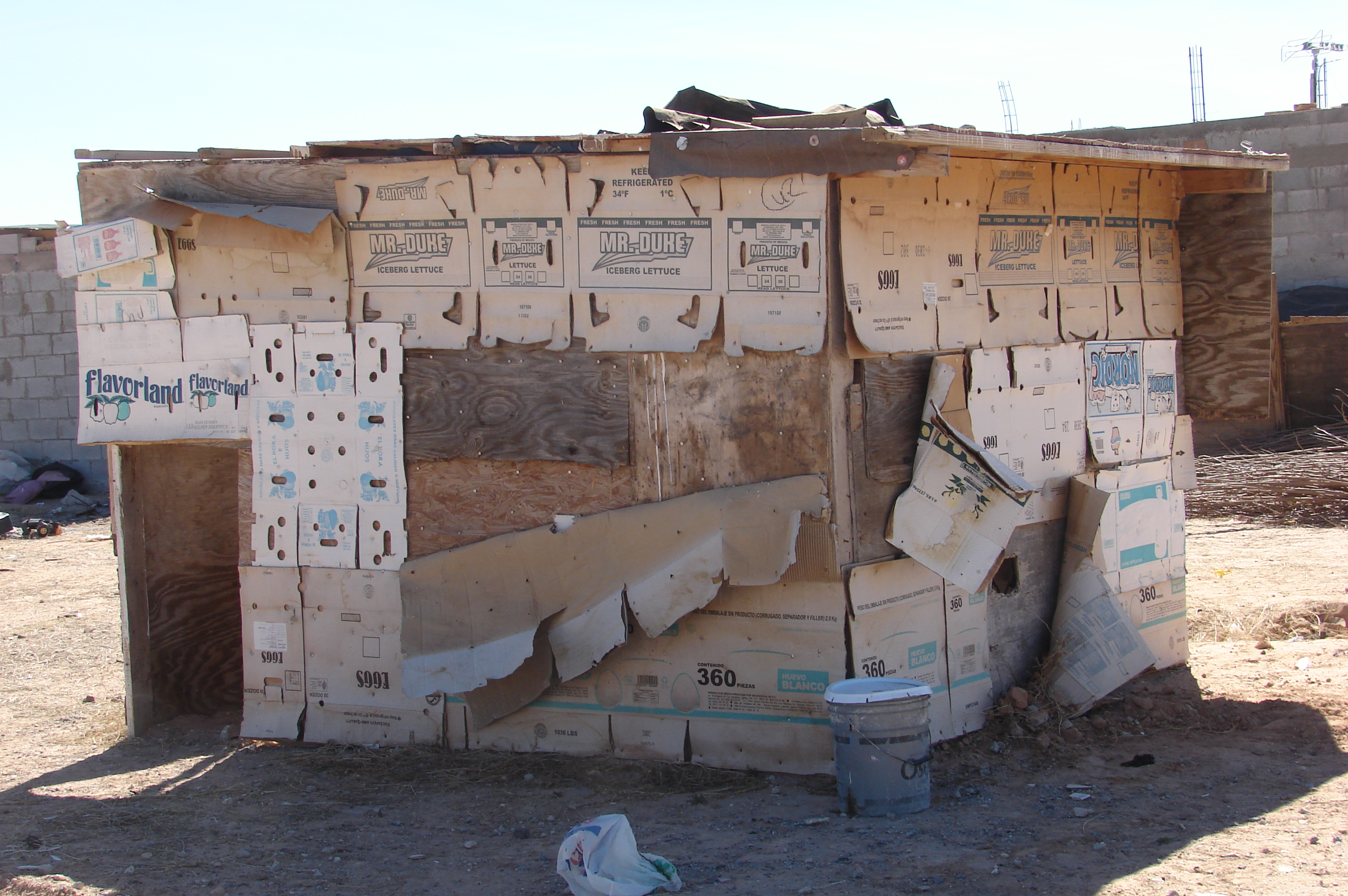Many United Methodist churches have worked through Proyecto Abrigo, a mission in Ciudad Juárez, Mexico, to replace homes such as this one with cinder-block structures. Mission teams were shut out of Juárez for about three years, due to drug cartel-related violence, but have resumed going. Photo by Sam Hodges, UMNS