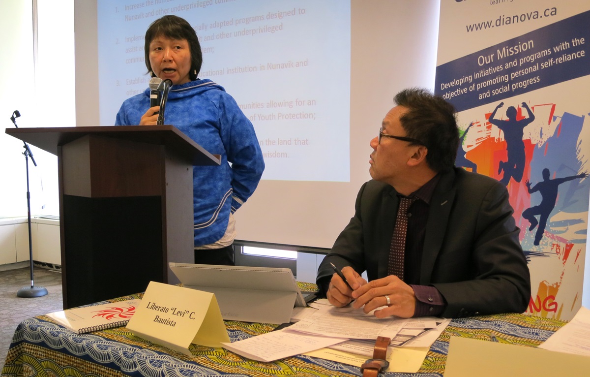 Liberato “Levi” Bautista, right, an executive with the United Methodist Board of Church and Society, listens as Jeannie Sappa, an Inuk from Nunakvik in northern Quebec Province, discusses the situation of women in her indigenous community during a March 17 panel at the Church Center for the United Nations. Photo by Linda Bloom, UMNS